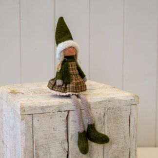 Fabric Sitting Girl in Green Outfit