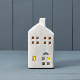 Ceramic house tealight with reactive glaze